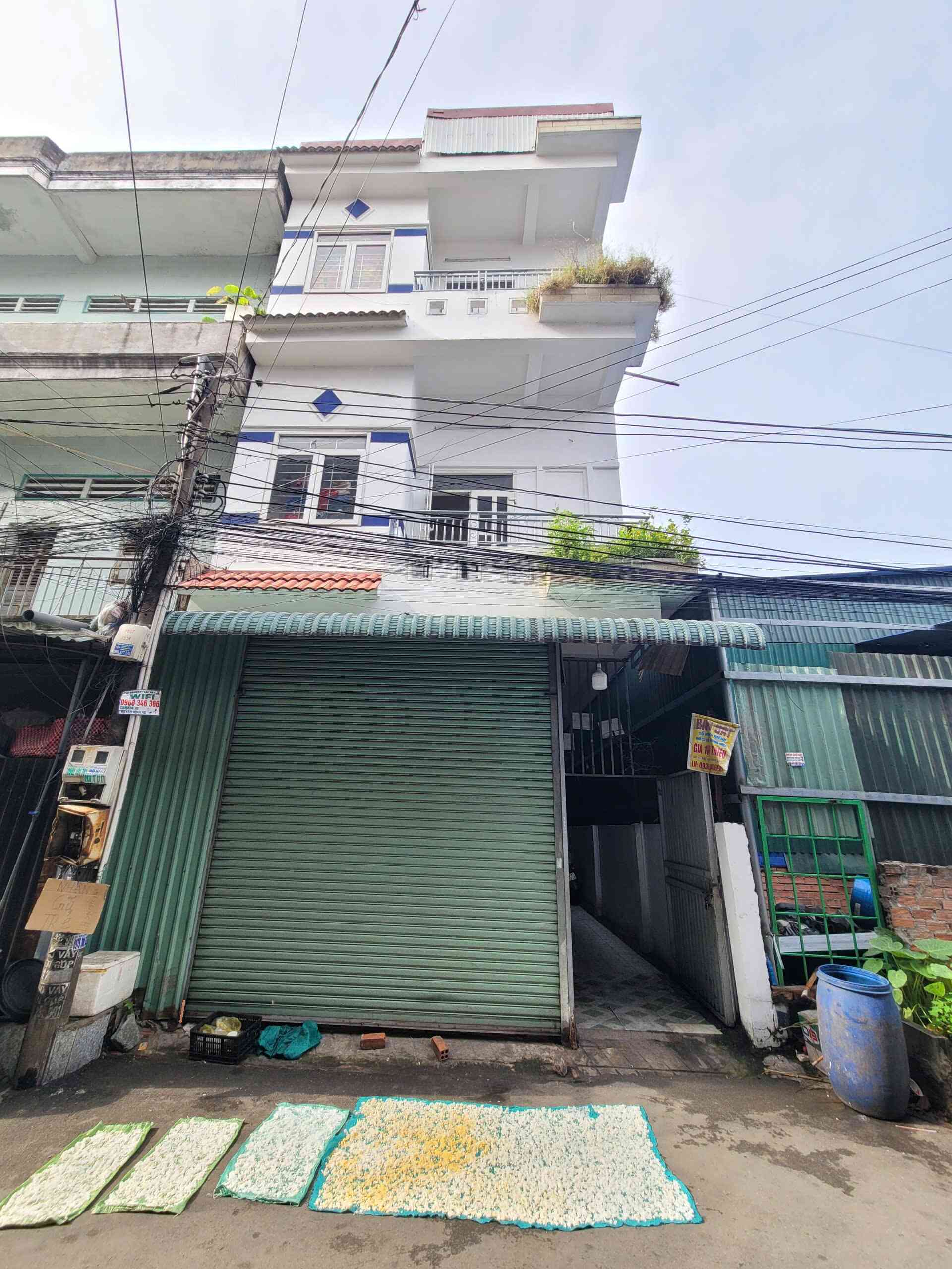 Bán nhà 1T2L và dãy trọ 5.5x22m, hẻm ĐT.743 P. Tân Đông Hiệp, thu nhập 18tr/th thổ cư 100%