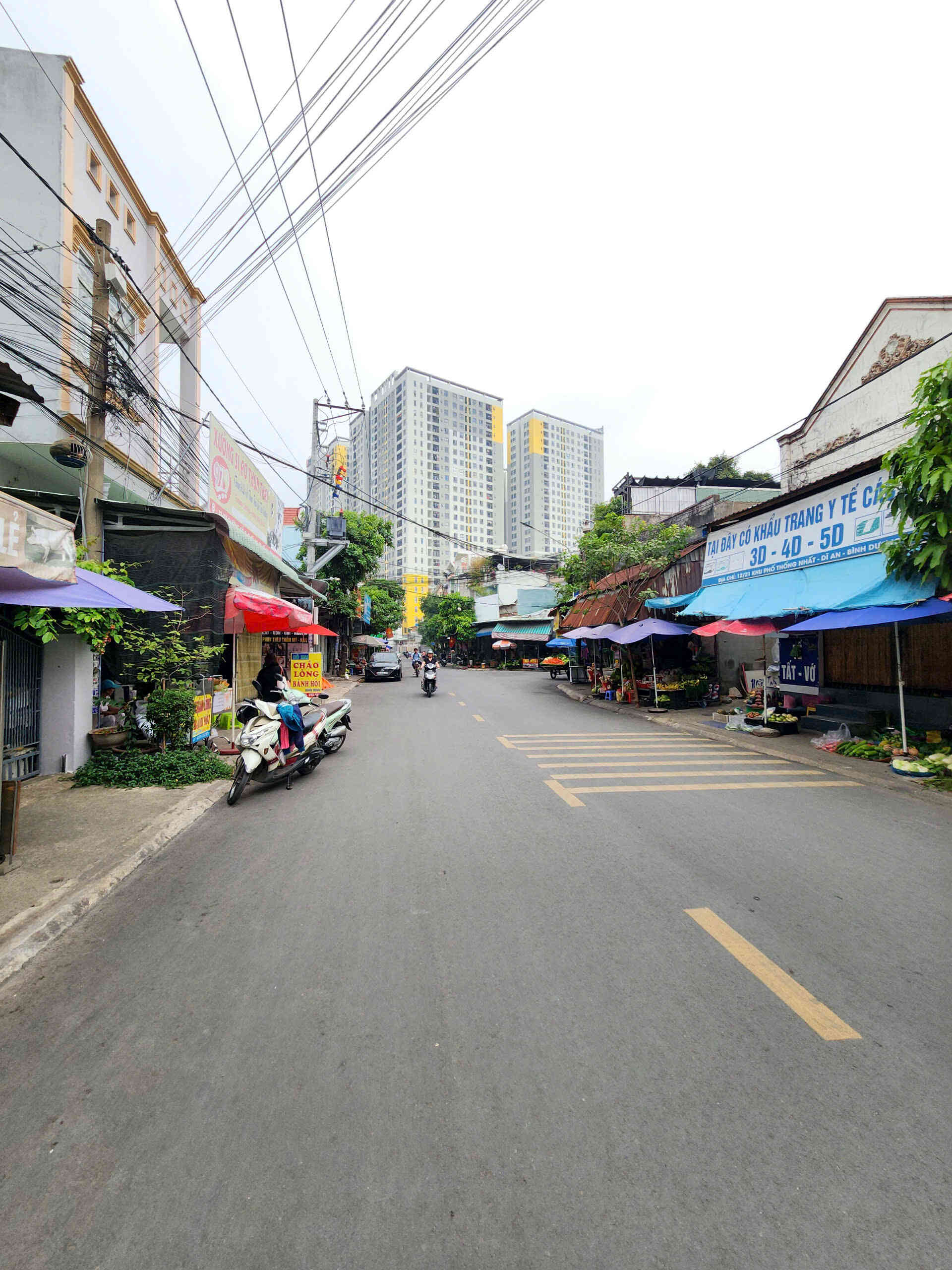 Bán nhà 1T1L và dãy trọ 10x46m, mặt tiền chợ xóm vắng, p.Dĩ An, thu 40tr/th