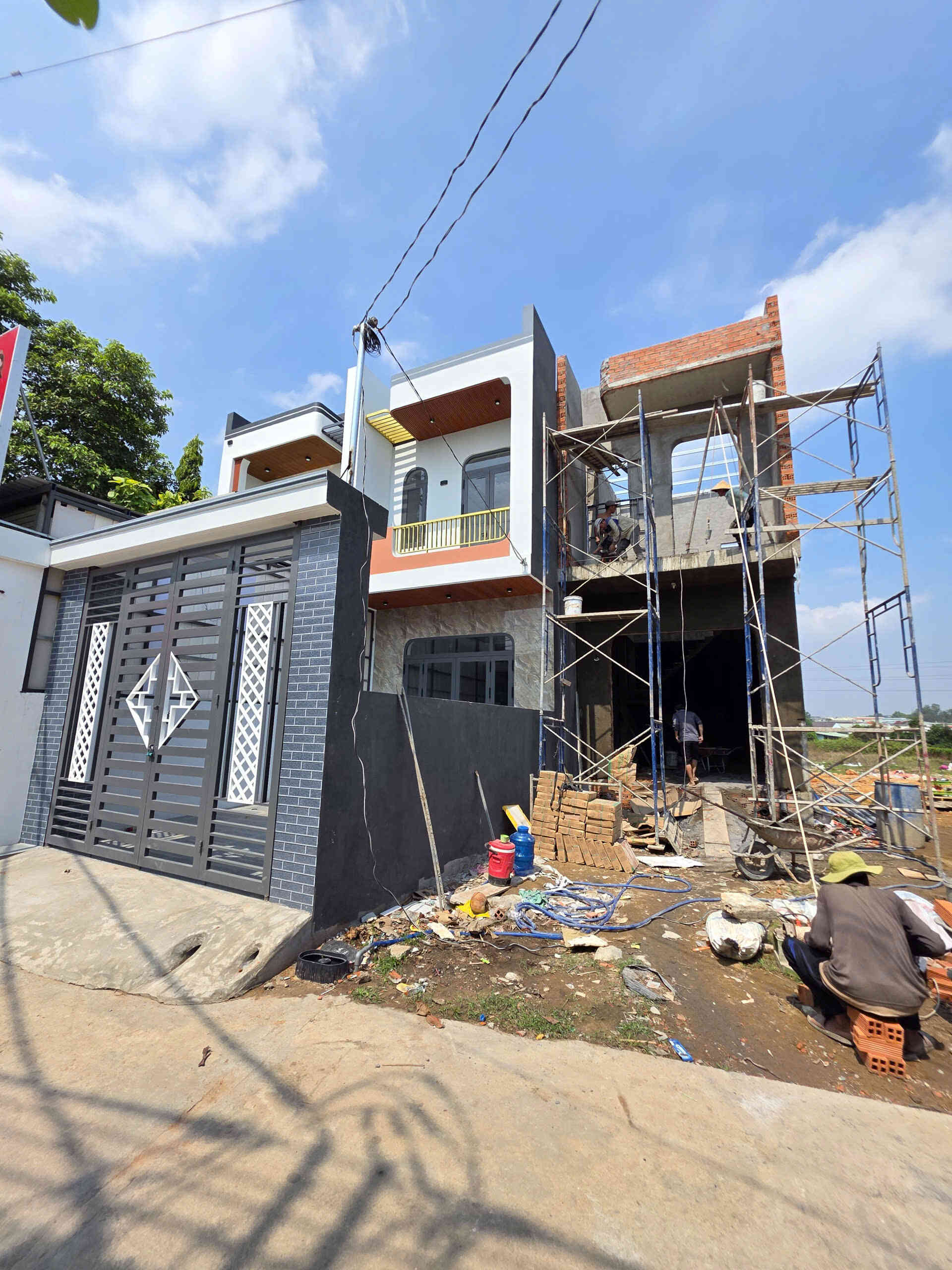 Bán nhà mới (đang xây) 1T1L 4×21.5m hoàn công, hẻm ĐT.747C p. Tân Khánh